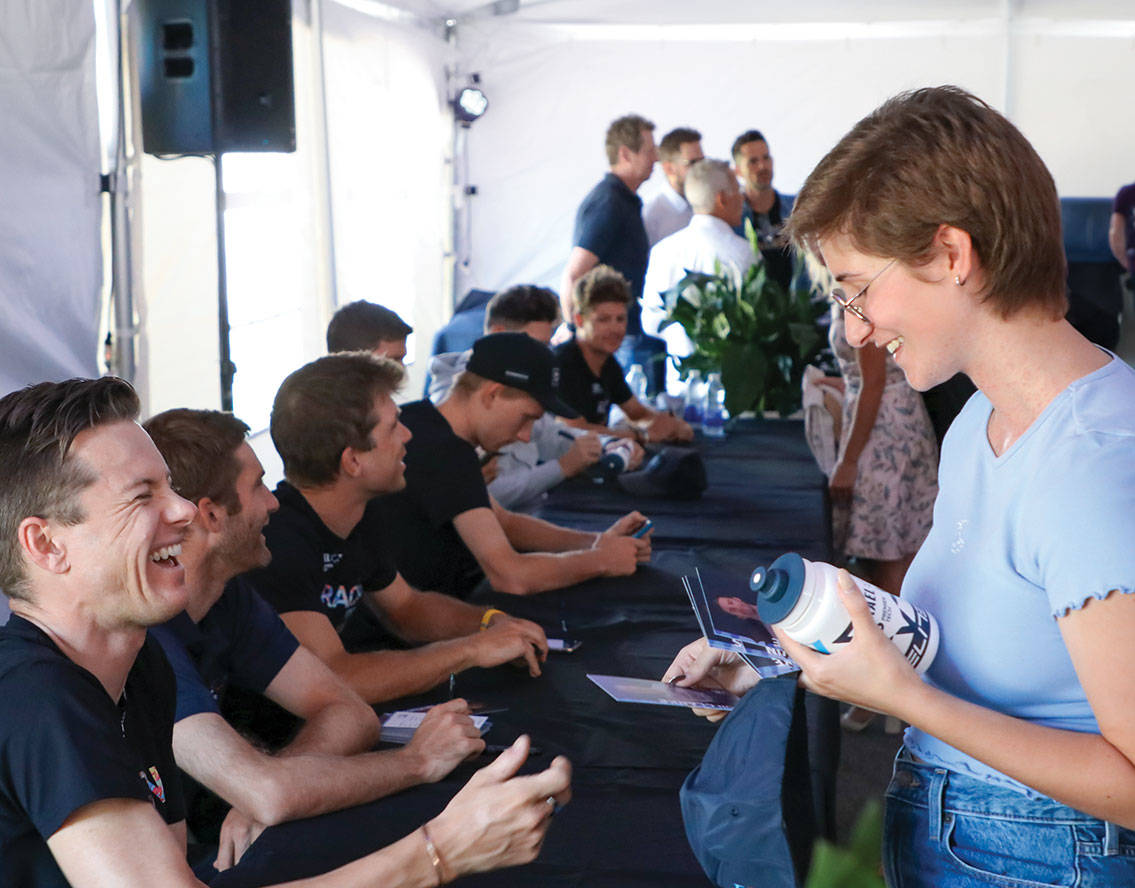 Britanie Cauchon and the Israel - Premier Tech team during an autograph session