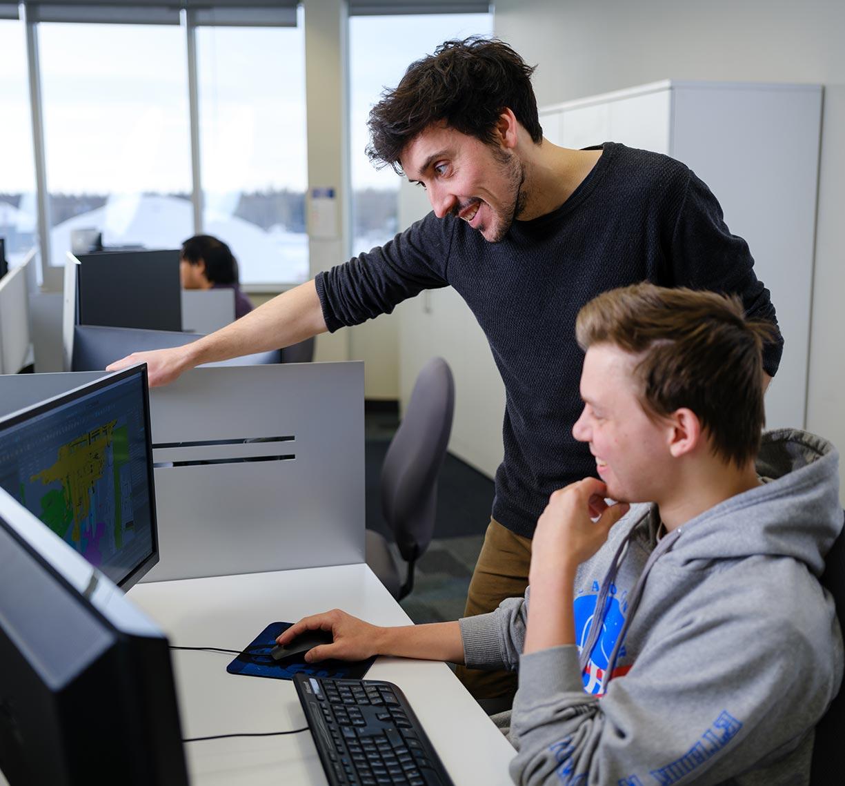 Team member working on a computer